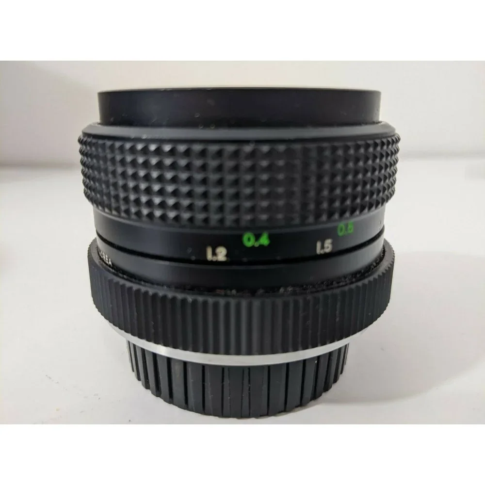 Beston M.C 1:2.8 F=28mm camera Lens with lens cap & leather case